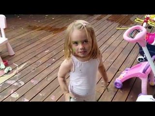 Little Girls Create Colorful Mess on the Patio