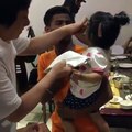 Jackie chan feeds food to litile boy