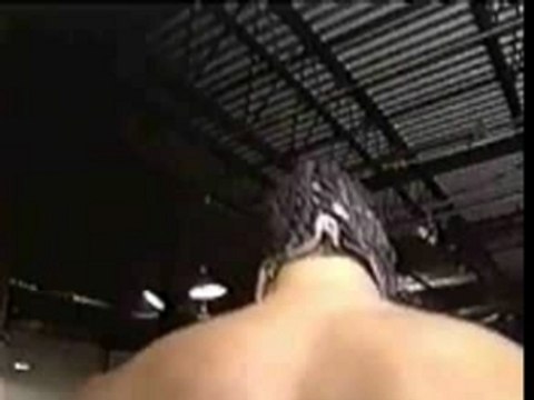 WWE - ECW-Rey Mysterio Jr.jumps off a balcony and Huracarana