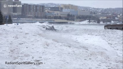 Impressive 'icy wave eruptions' and ice dunes on Lake Superior