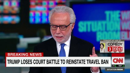 Trump furious after court upholds block on travel ban