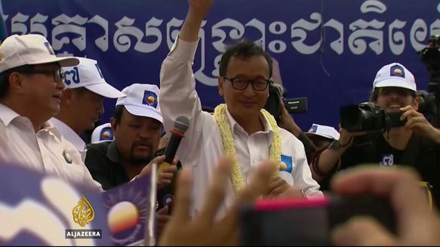 Cambodia's exiled opposition leader resigns from party