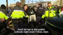 Betsy DeVos is blocked by protesters from entering a school