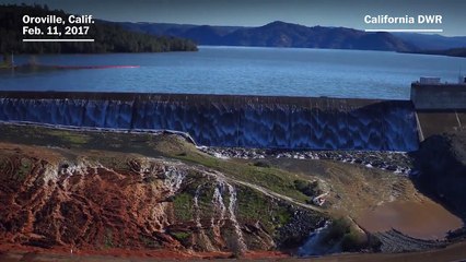Water overflows into Calif. dam’s emergency spillway