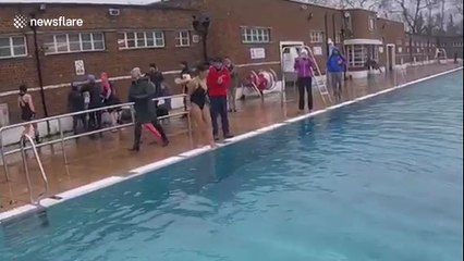 Casey Batchelor swims for charity at Hampstead Lido Charity Chilly Dip