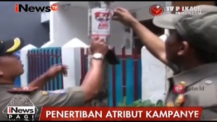 Video herunterladen: Masa Tenang Pilkada DKI Jakarta, Pol PP Tertibkan Atribut Kampanye