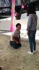 Guy begging his angry gf for a second chance in public at Orchard Road