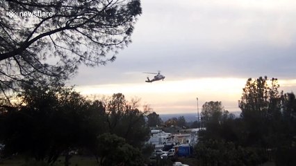 Helicopters transport rocks to repair Oroville dam