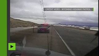 Wind Blows Truck On Police Car