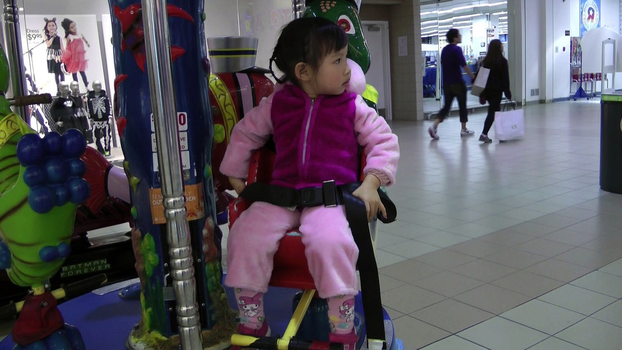 Girl On The Kiddie Ride