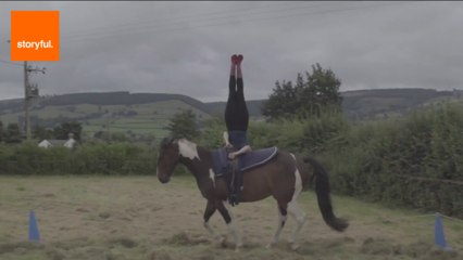 Woman Performs Acrobatics on Horse