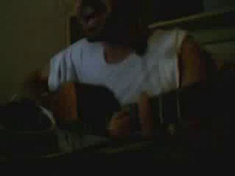 war bob marley chant guitare