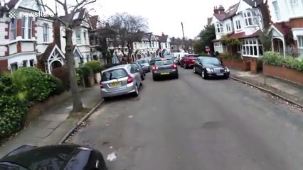 Driver appears to hit Porsche while reversing