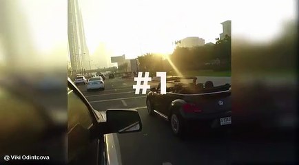 تدلت من قمة أحد أبراج دبي دون حماية..عارضة أزياء روسية تغامر بحياتها