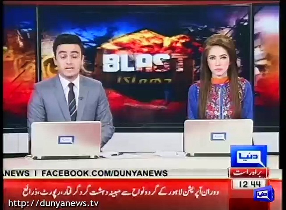 Protesters recover wine bottle from police van in Sehwan Sharif.