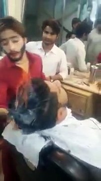 INCREDIBLE! Barber Uses FIRE To Cut Hair in Pakistan