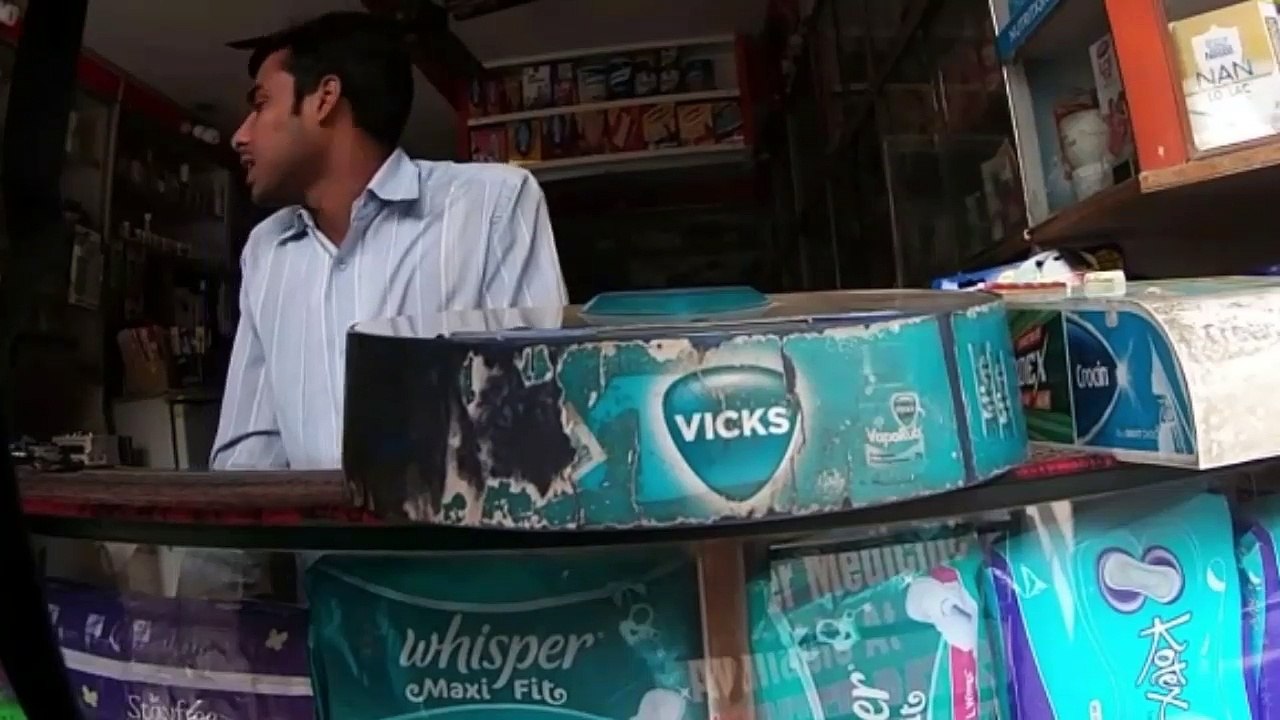 Girl Buying Femal Condom In Medical Shop At Dehli
