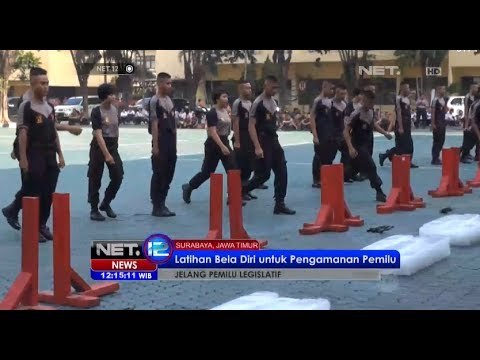 NET12 - Aksi ketampilan bela diri oleh anggota pengendalian massa Polda Jawa Timur
