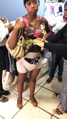 Shoplifter hiding clothes
