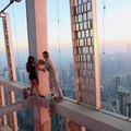 Russian Instagram queen dangles off a 1,000ft-higuh Dubai skyscrapero