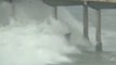 Surfer Rides Monstrous Waves During California Storm