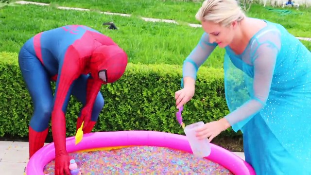 Frozen Elsa & Spiderman Buried Head in Orbeez sand surprise vs Joker Pranks Fun Superhero Real Life N