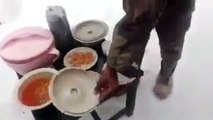 Pakistani Army Soldier shows his food to Indian soldiers