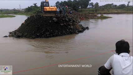 Hyundai Excavator Works On The Edge Of Ganga River