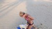 Cute Puppy Wants To Get Girl Out Of Her Bikini