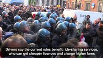 Italian taxi drivers clash with police during protest over Uber