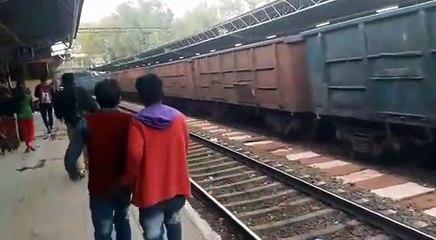 TRAIN PASSING OVER CRAZY LADY!