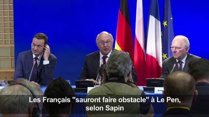 Les Français "sauront faire obstacle" à Le Pen, selon Sapin