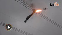 Flame Throwing Drone Helps Remove Net on UHV Power Line