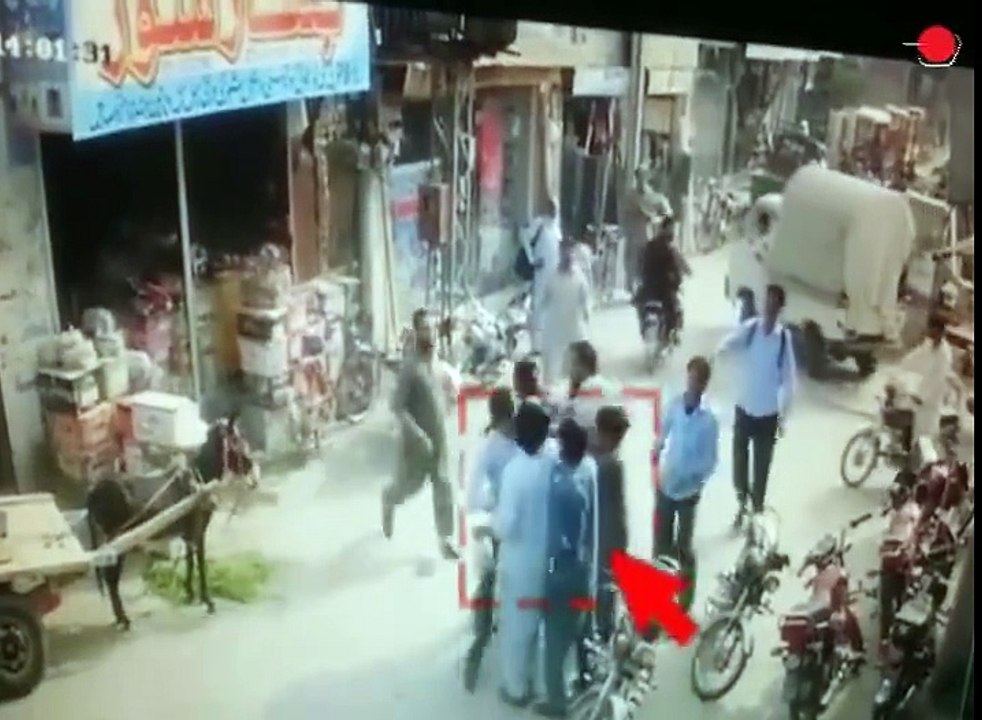 This clever man pickpockets while others are distracted