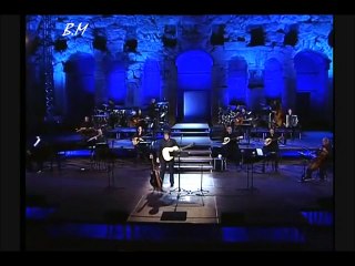 Κάπου νυχτώνει ----- Γιώργος Νταλάρας