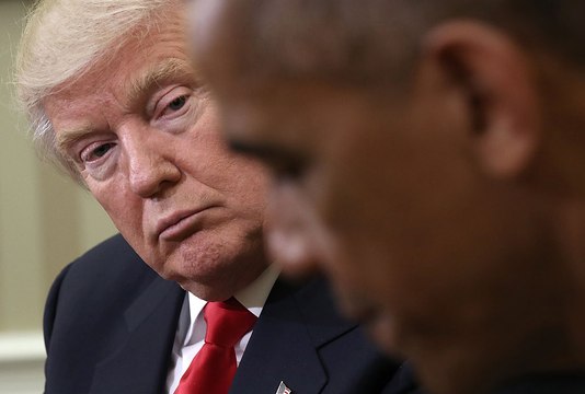 Trump blames Obama for protests, leaks