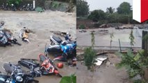 Flash flooding kills young girl, washes away scooters in Indonesia