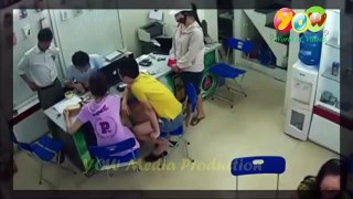 pretty girl caught on CCTV stealing mobile phone