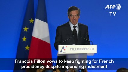 France's Fillon faces charges but stays in campaign