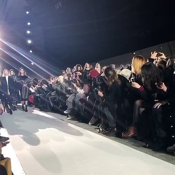 The finale at Dries Van Noten, his 100th show which he celebrated with some of the most famous models of the 90s