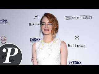 Emma Stone magnifique en robe blanche à la première de "L'homme irrationnel"