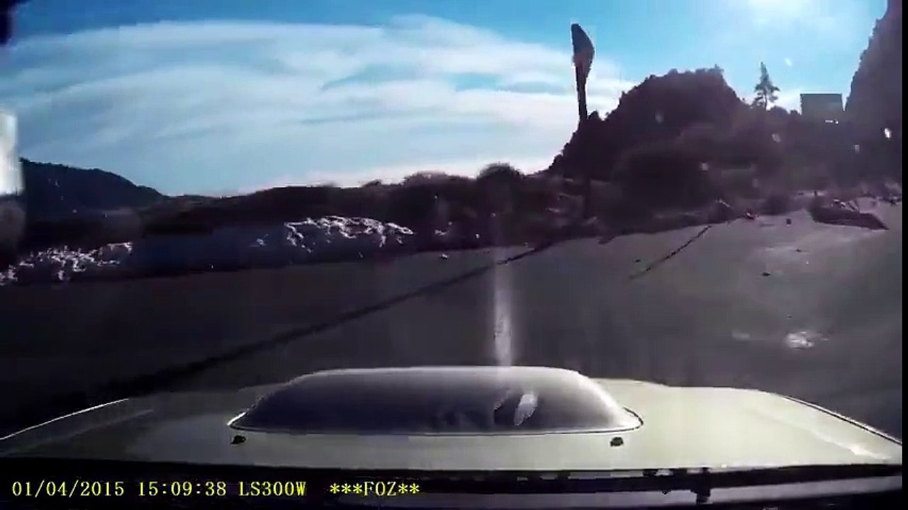 Subaru slides off edge