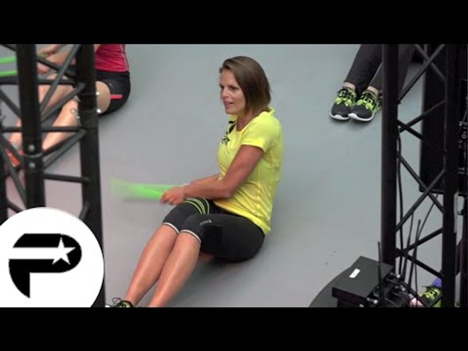 Laure Manaudou en pleine séance de gymnastique pour Reebok