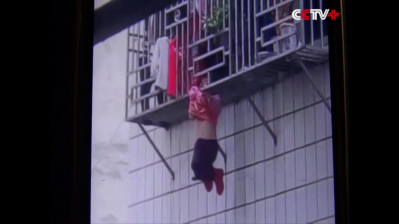 Two Men Save Girl Hanging by Neck From Fourth Storey Window