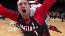 Un fan des Blazers gagne une voiture sur un panier du milieu du terrain