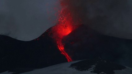 Lava spurts into the sky as Mount Etna erupts
