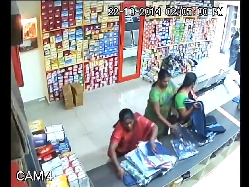 Thief caught on CCTV in Textile Shop -#Social Media Viral News