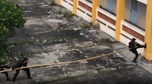 Pour escalader un immeuble la police vietnamienne utilise une technique incroyable
