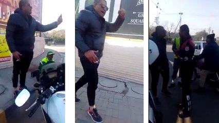 Man Misbehaving with dolphin and traffic police