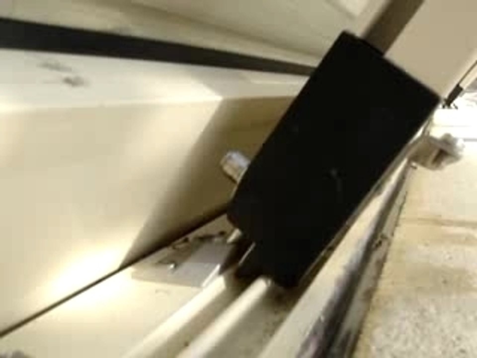 Déverrouillage automatique d'un abri piscine Sésame